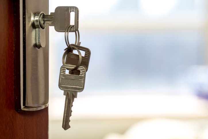 keys hanging from door lock