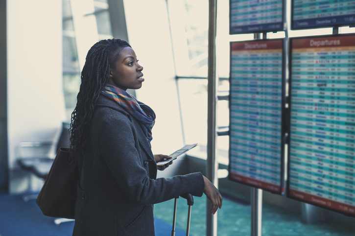 female business traveler at airport