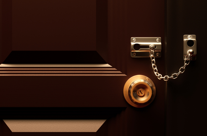 close up of door chain lock