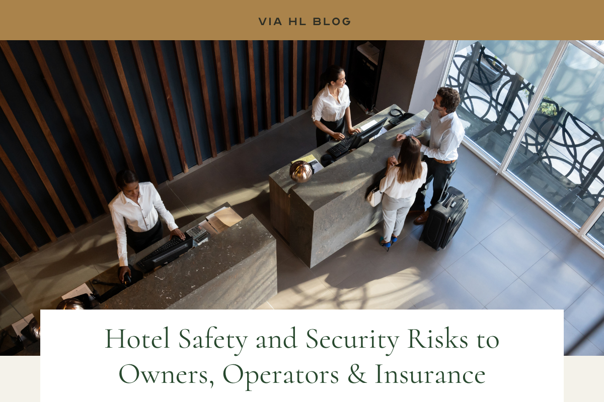 Via HL Blog | image: aerial view of hotel reception desk, with employees checking guests in | Hotel Safety and Security Risks to Owners, Operators & Insurance