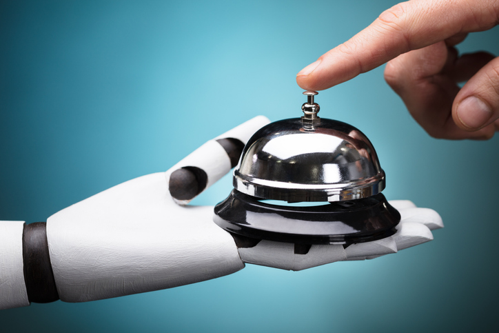 Person Ringing Service Bell Hold By Robot