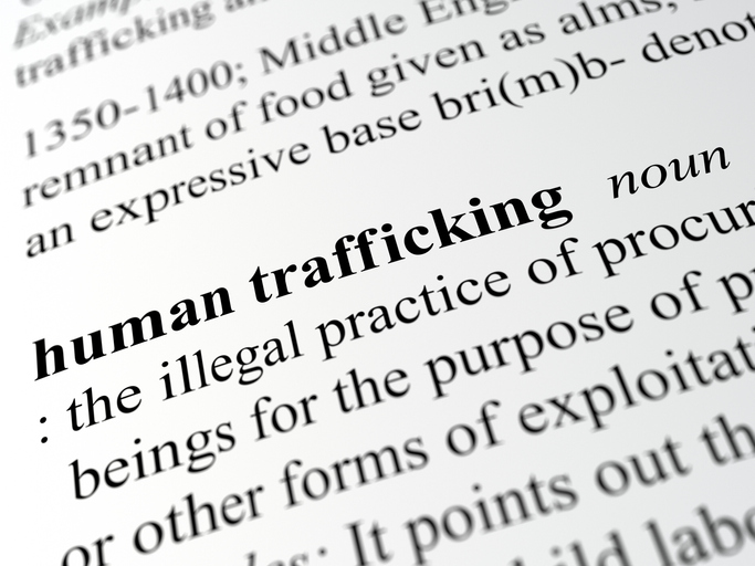 close-up of human trafficking definition