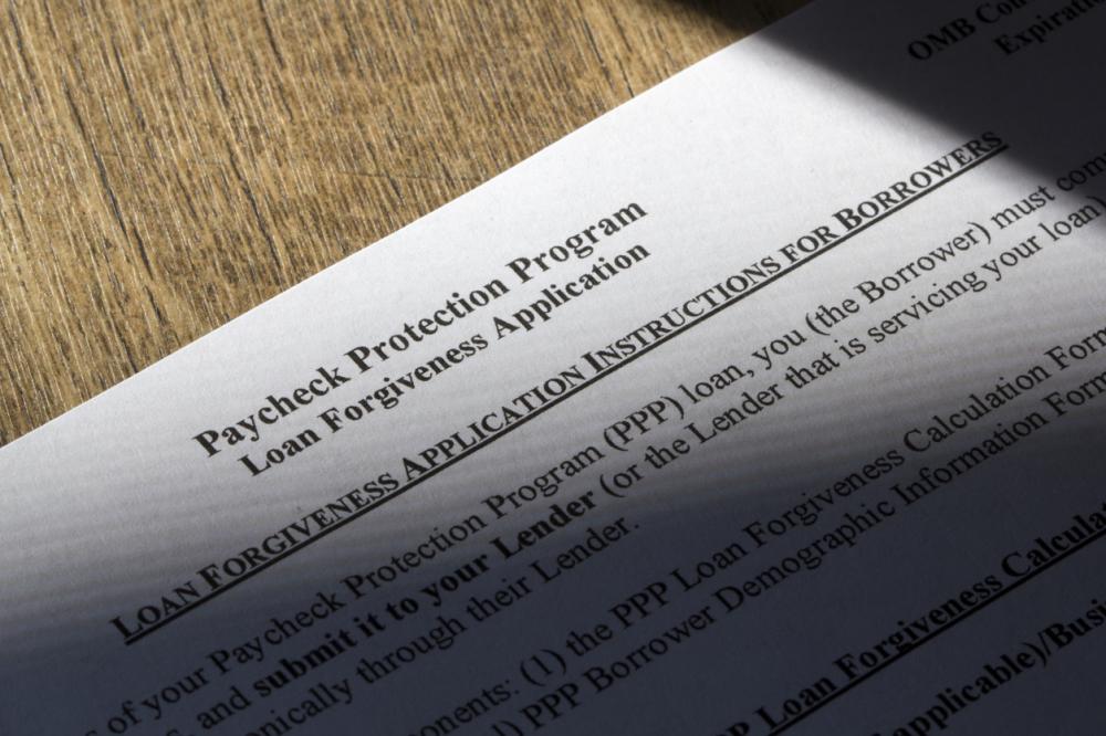 Closeup of SBA's Paycheck Protection Program (PPP) Loan Forgiveness Application Instructions For Borrowers document.
