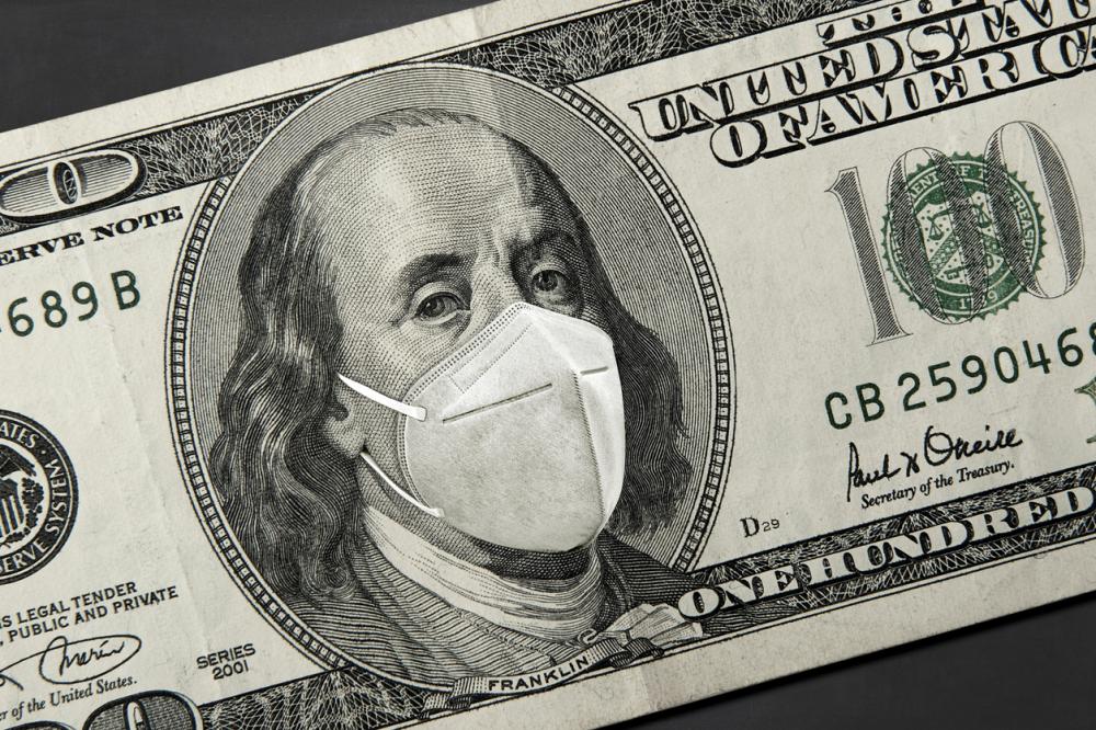 Benjamin Franklin wearing a face mask on a one hundred dollar bill