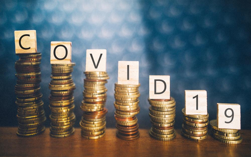 Diminishing stacks of coins with COVID-19
