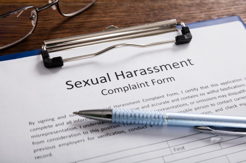 sexual harassment complaint form on clipboard