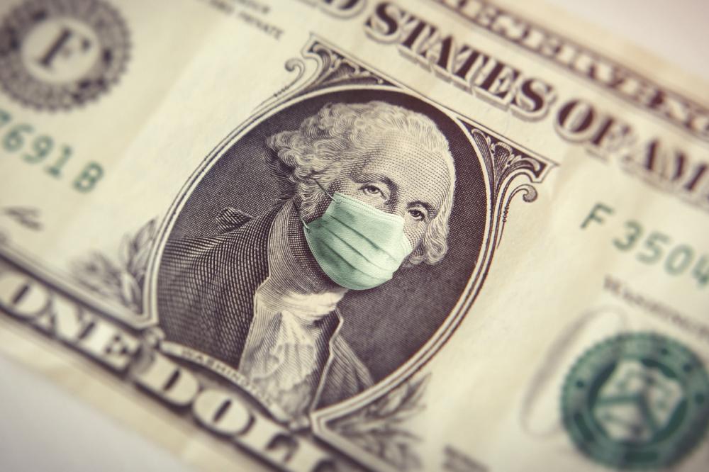 dollar bill with George Washington wearing a face mask